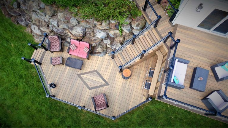Aerial view of a composite deck with a fire table and seating