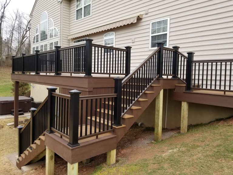 Deck staircase with black aluminum railing