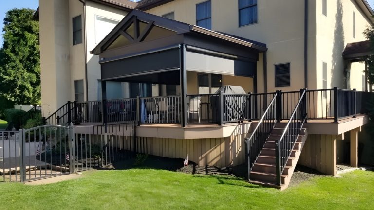 Raised deck with a roof structure and black railing