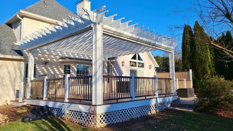 White pergola over a raised deck
